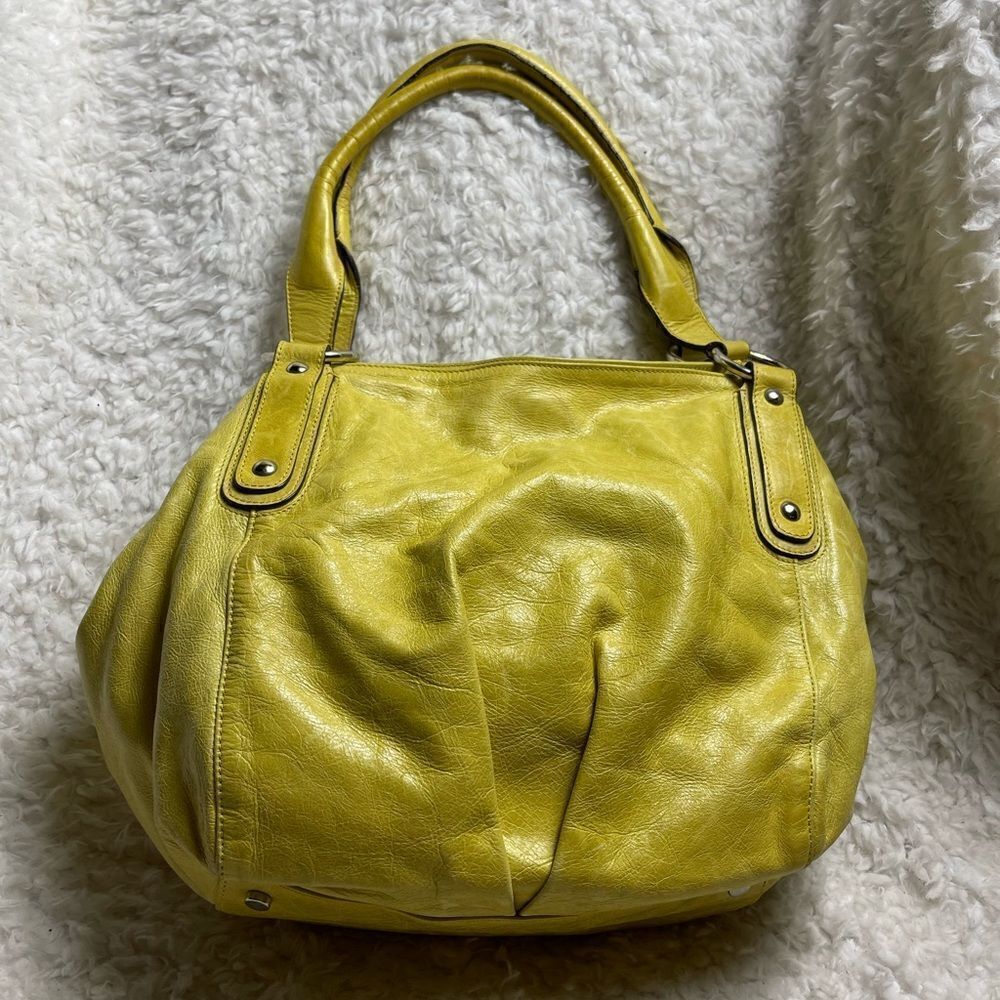 ABRO leather Hobo yellow shoulder bag with silver tone hardwares.
